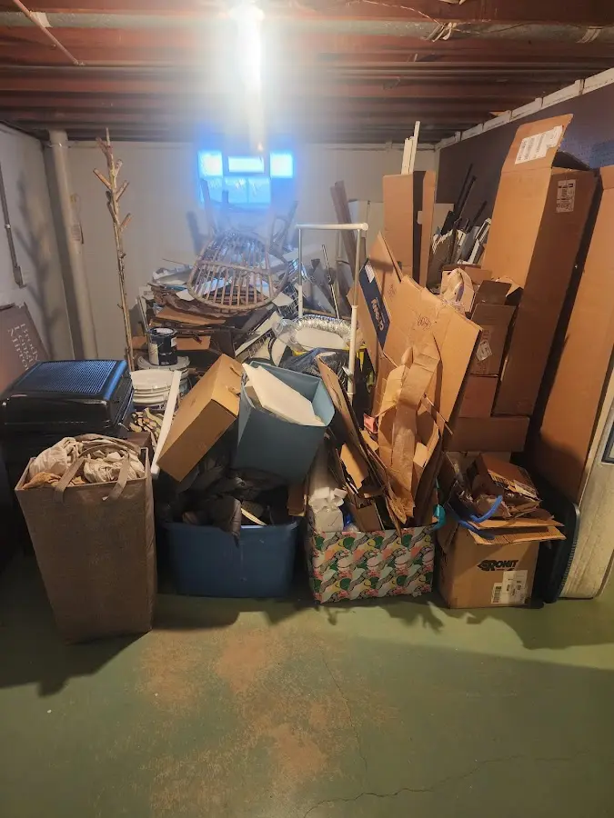 Roll-off dumpster container at job site for Cleanout Dumpster Rental in Alton